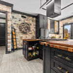 Kitchen cabinets with dark Midnight stain on Rustic Alder.