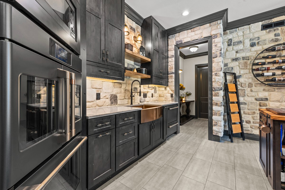 Kitchen cabinets with dark Midnight stain on Rustic Alder.