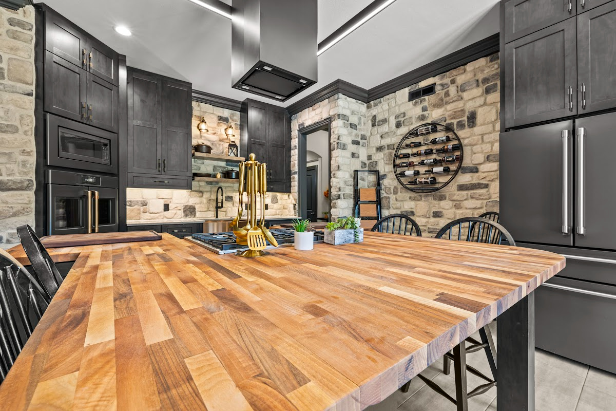Kitchen cabinets with dark Midnight stain on Rustic Alder.