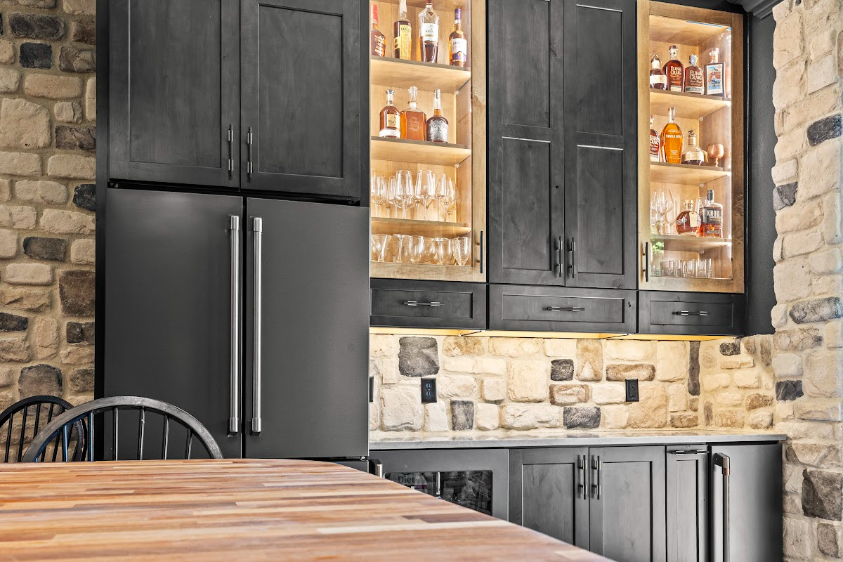 Kitchen cabinets with dark Midnight stain on Rustic Alder.