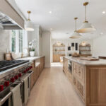White and light brown kitchen cabinets.
