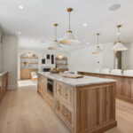 White and light brown kitchen cabinets.