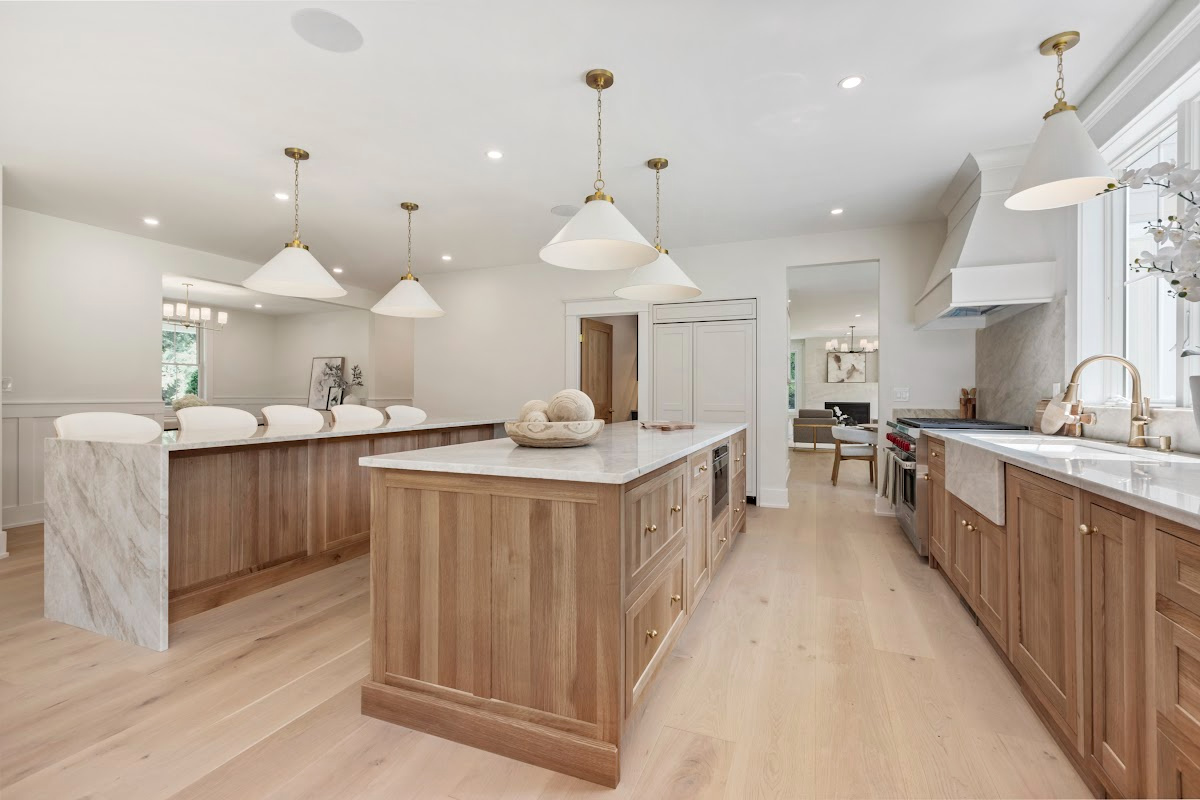 White and light brown kitchen cabinets.