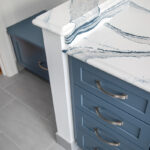 Bathroom with blue cabinetry