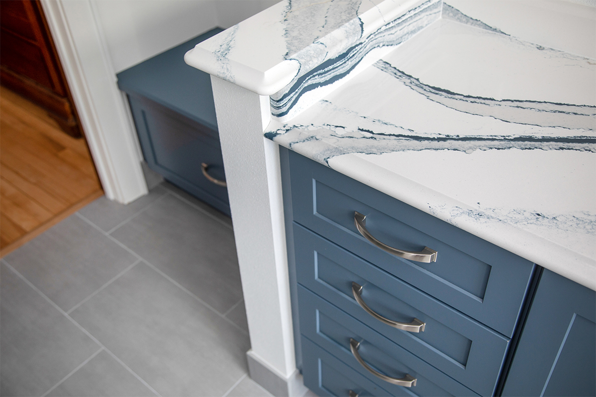 Bathroom with blue cabinetry