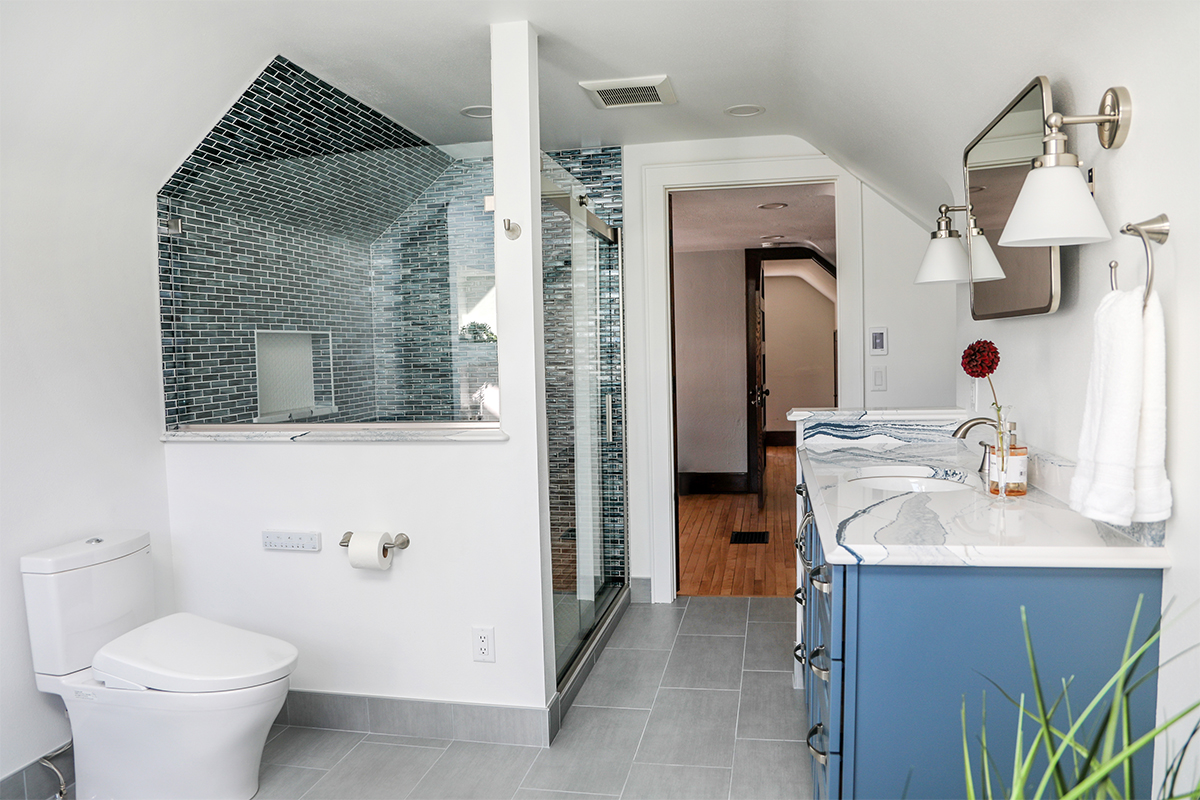 Bathroom with blue cabinetry