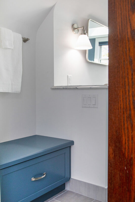Bathroom with blue cabinetry