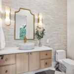 Floating bathroom vanity in Vita stain on Rift White Oak.