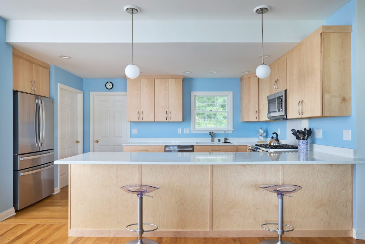 Modern Mid-Century kitchen with slab doors in maple natural