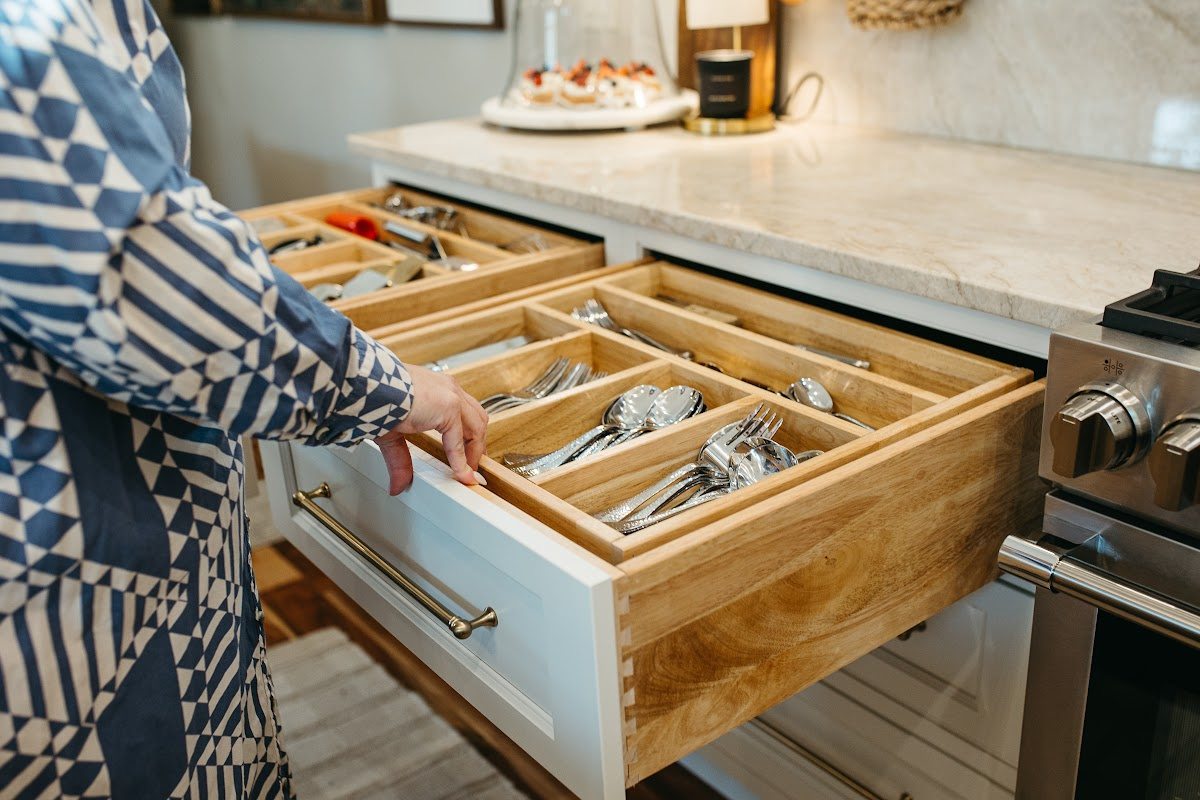 Drawer open showing silverware organization accessores.