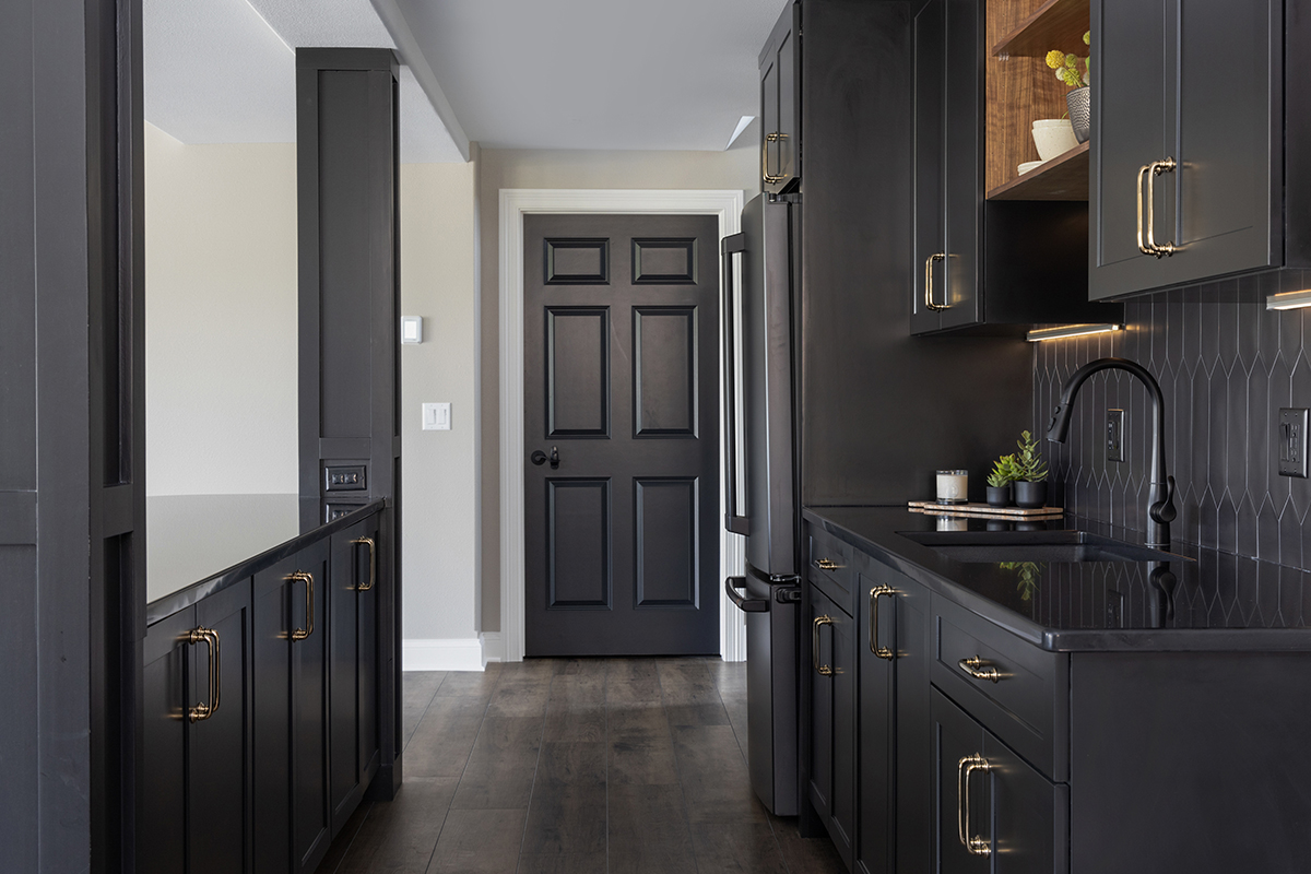 Painted black basement bar cabinets