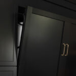 Painted black basement bar cabinets