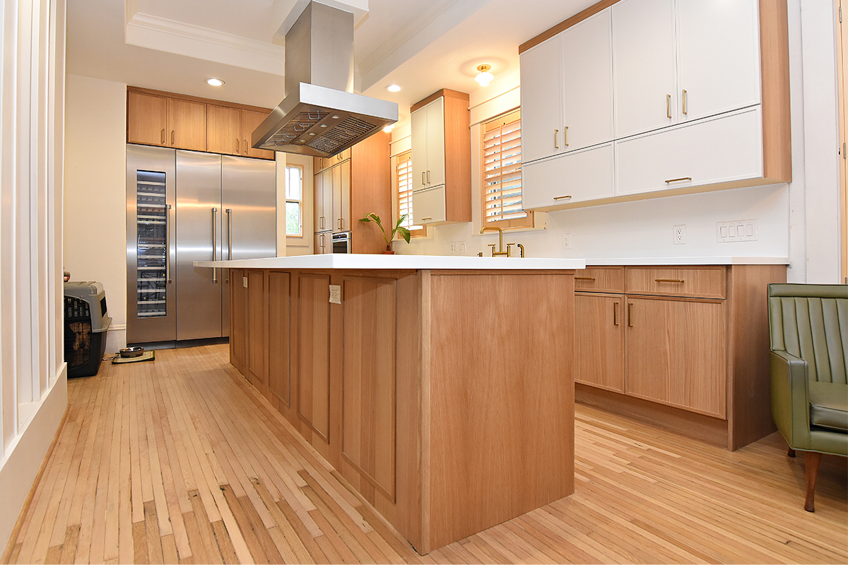 Painted and stained kitchen cabinets.