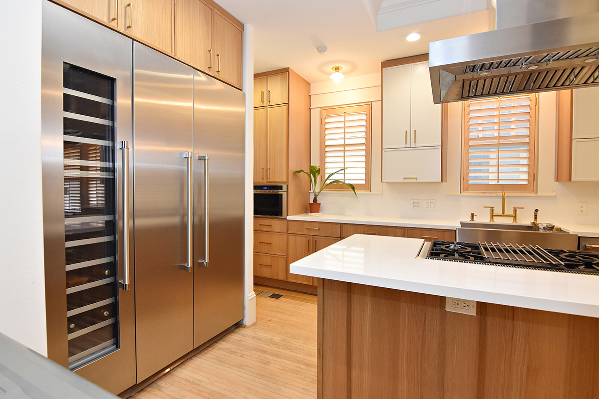 Painted and stained kitchen cabinets.