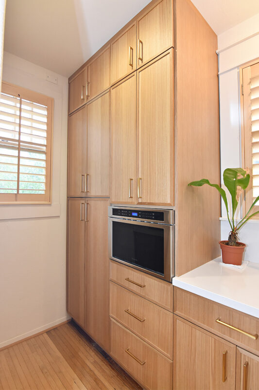 Painted and stained kitchen cabinets.