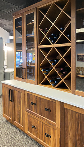 Built in wine rack with surrounding cabinets in Sioux Falls Showplace Design Center Showroom