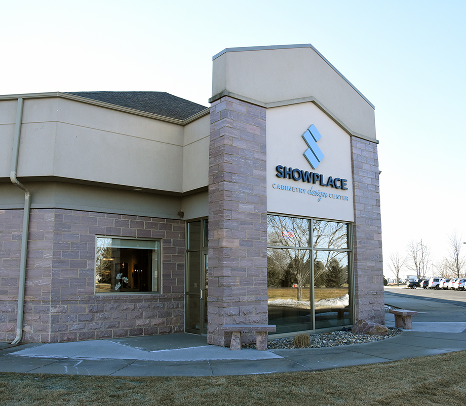 Shows the external buidling of Showplace Cabinetry Design Center Harrisburg. Building has a modern look with local quartz used in place of bricks.