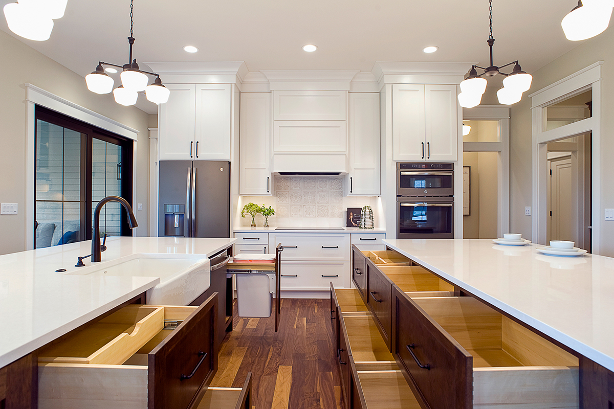 Brown stained and white kitchen cabinets