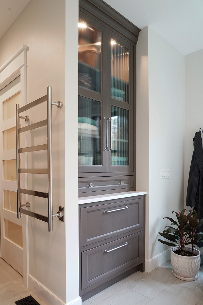 Dark stained bathroom cabinets