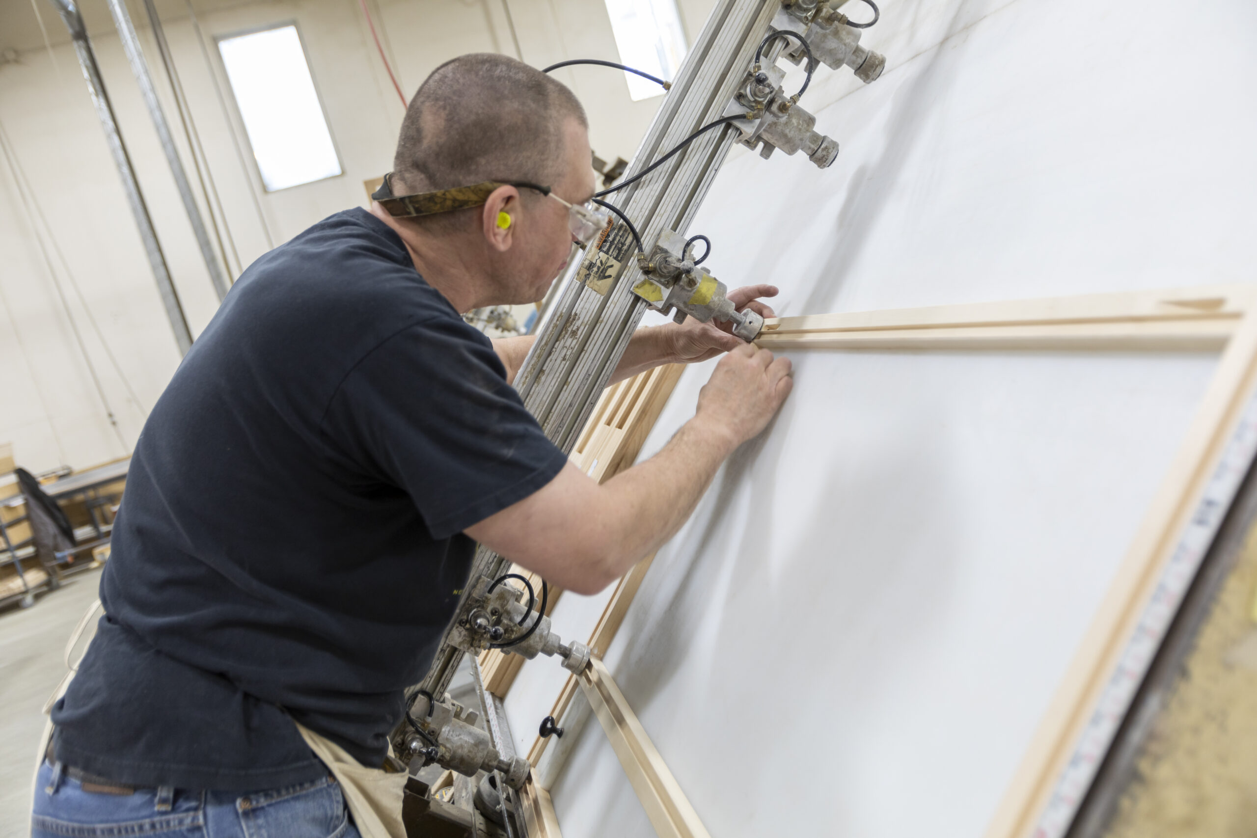 Craig Oshund creating a face frame on a framing table at showplace in sioux falls, sd.