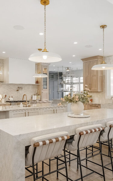 Stained and painted kitchen cabinets with 2 islands