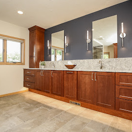 Stained master bath vanity cabinets