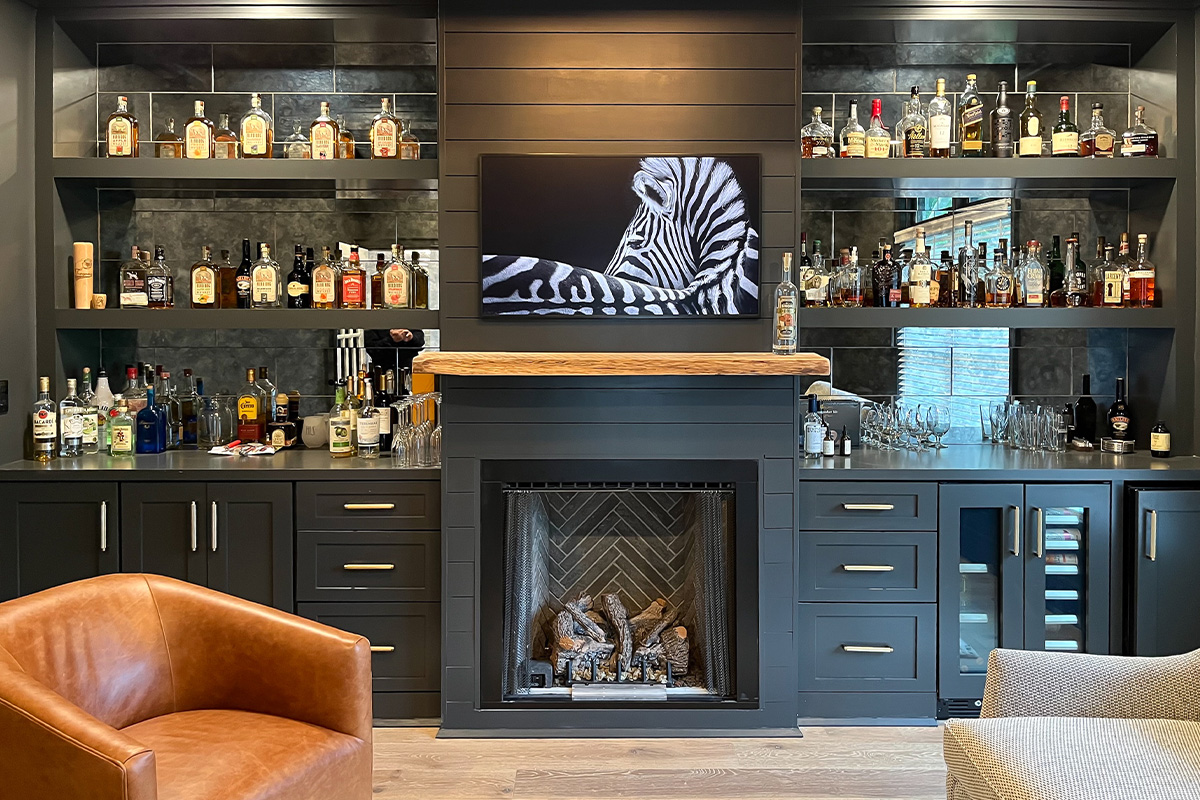 Living space with bar and fireplace.