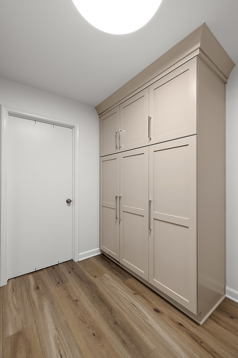 Light Mocha painted kitchen pantry cabinets.