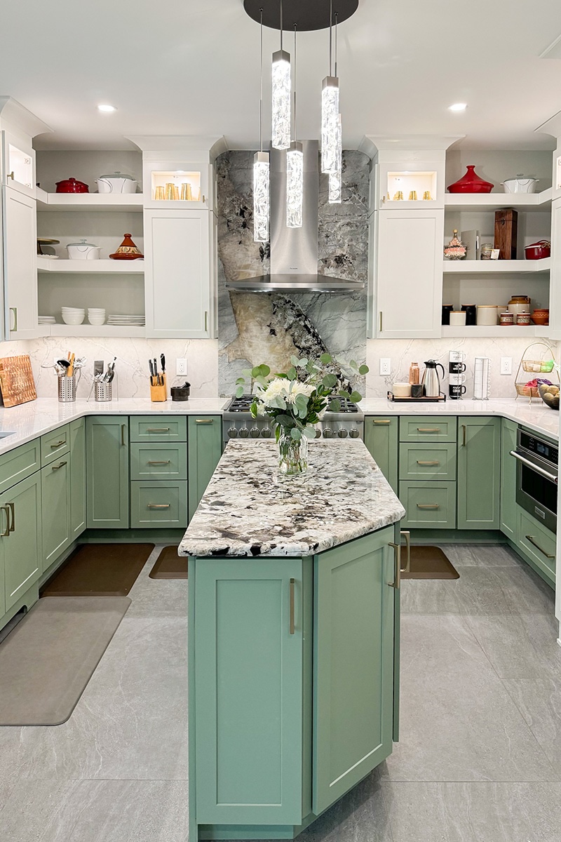 Painted kitchen cabinets in green bases and white wall cabinets
